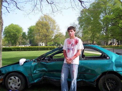 My son Danny standing next to the car used in the simulation.