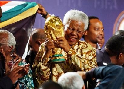 Nelson Mandela with the World Cup as South Africa are the host nation of the 2010 World Cup