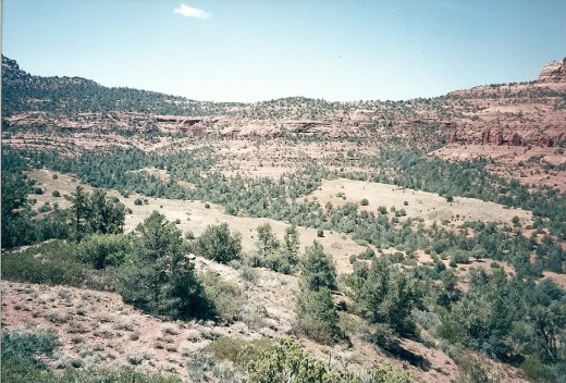 "Come back.." whisper the red hills..