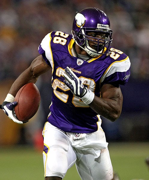 Minnesota Vikings Running Back Adrian "All Day" Peterson taking it to the house! photo NFL.com