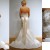 Wedding Dress:Alvina Valenta Bridal Gowns, Wedding Dresses: Style AV9800 Oyster silk duchess satin fluted bridal gown. Softly scooped strapless neckline with a hand beaded and embroidered bodice. Candlelight pure silk satin sash at natural waist lead Wedding Dress:Alvina Valenta Bridal Gowns, Wedding Dresses: Style AV9800 Oyster silk duchess satin fluted bridal gown. Softly scooped strapless neckline with a hand beaded and embroidered bodice. Candlelight pure silk satin sash at natural waist lead