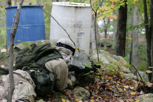 Hiding behind barrels provides good cover, but it is very easy to spot you and keep track of your position!