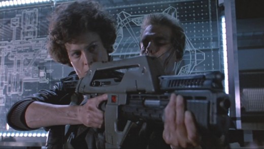 Ripley learning how to use the pulse rifle from Hicks in Aliens