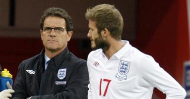 Capello and Beckham. It looks like Beckham may have a coaching role for World Cup 2010