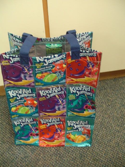 This colorful bag is made from a recycled Kool Aid drink pouches. This is why this bag is literally kool and is great for advertising