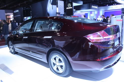 A rear quarter view shows some of the Honda Clarity's style.