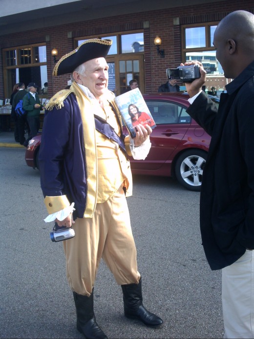 My son and I are citizen journalists, always looking for the next story. Here I capture his discussion with a  man fully dressed in "Patriot" garb to attend the November '09 Sarah Palin book signing in Cincinnati.