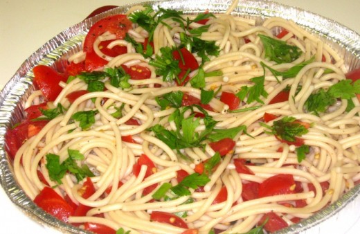 parsley garnish on plate of spaghetti