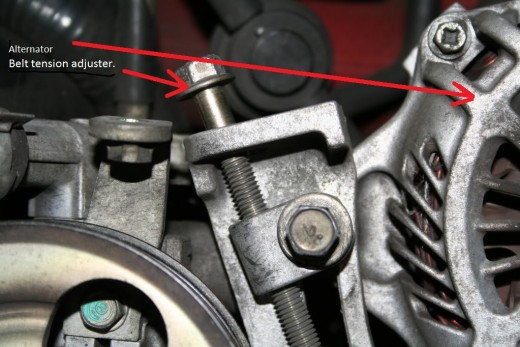 Don't forget to slightly loosen the other mount bolts to allow the alternator to swing. This tensioner will need to be  wound back to get the belt off, or wound on to tension the belt. If you can see the belt is in good condition re tension the belt.