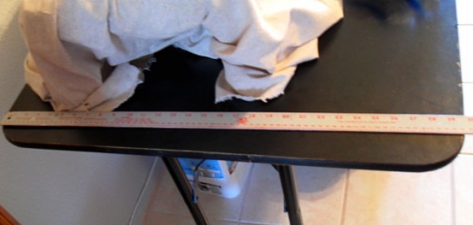 Measure the width of the table top, the length of the table top. For a three sided table skirt like the one in this project, add the width X 2, plus the length. This will give you the width of the table skirt.  