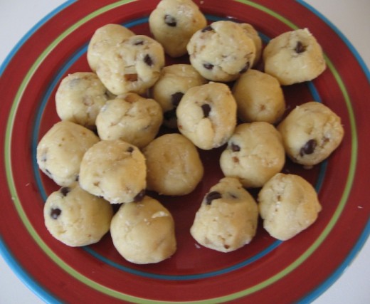 Mixture for the Walnut Biscuits rolled and ready for the oven