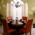 The stenciled walls in this relaxed, yet formal dining room add a nice touch and is easy and inexpensive to do.