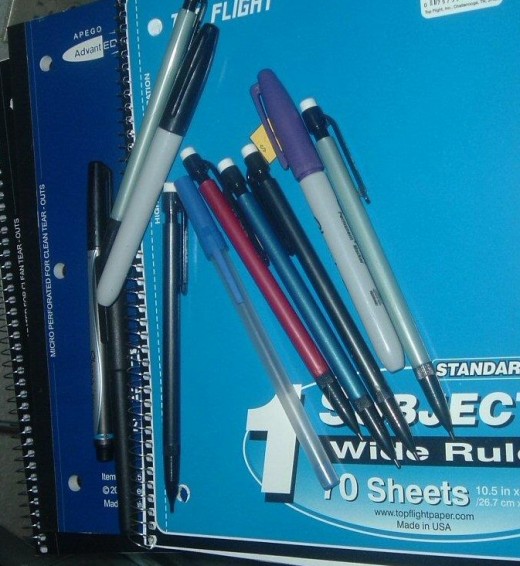 Keep a stack of notebooks and pens to encourage you to write in your journal