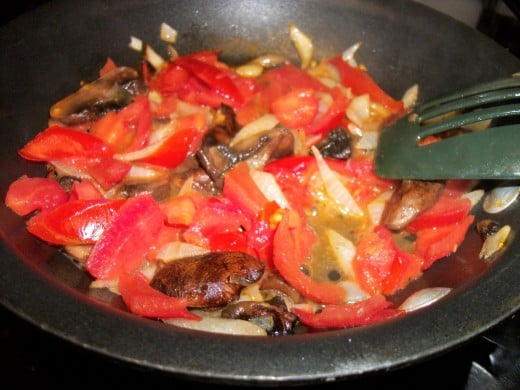 Onions, mushrooms and peppers.  Personal photo.  