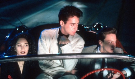 From left to right: Jami Gertz as Blair, Robert Downey, Jr. as Julian, and Andrew McCarthy as Clay in the film adaptation.