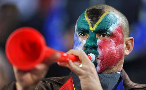 Fan blowing a vuvuzela