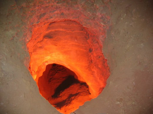 This is the Devil's Hole.  Legend has it that if you look into the hole and see the devil's face, you have been doing evil in your life.  The hole is about thirteen feet deep until it closes down to about the size of a softball.  They are not sure wh