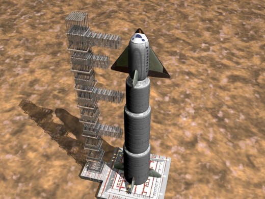 The illustration above shows the entire rocket ready to launch next to it's launch tower.