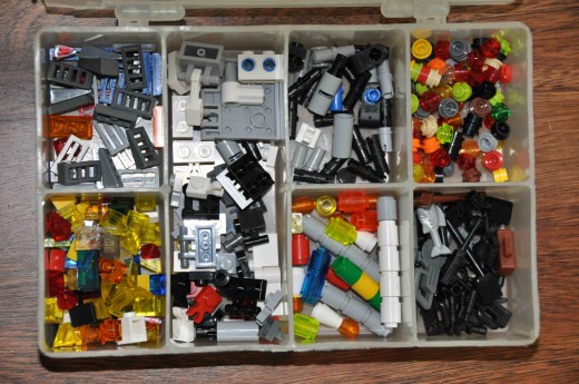 Little pesky pieces, clockwise from upper left:  grills, special joints/mounts, axles, round lights, small tools, cylinder lights, and square lights.  At least, that's what we call 'em.