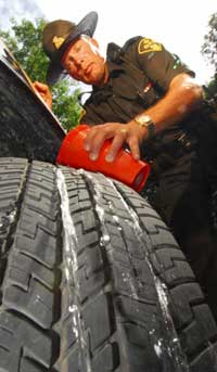 water gets in the deep tread of the tire leaving more surface area against the road to prevent hydroplaning