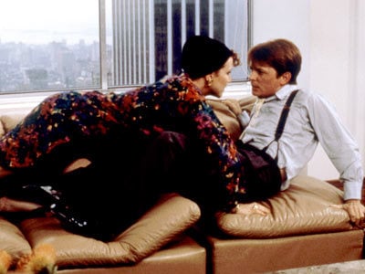 Margaret Whitton and Michael J. Fox in "The Secret of My Success"