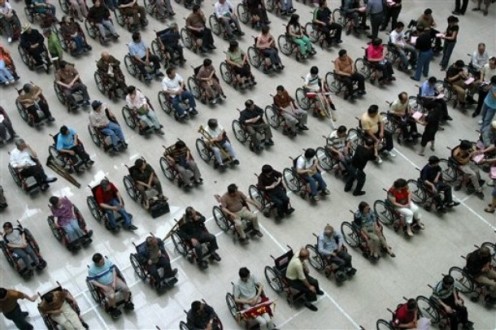 One hundred and thirty nine disabled people received wheelchairs ahead of the National Day of Disabled Persons.