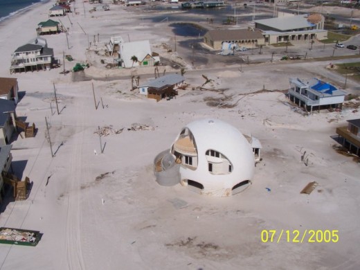 Pensacola beach sand after Hurricane Dennis finished shifting it around.  My in-laws used to have a beach house near the upper edge of this frame; Dennis took it.  Image courtesy Wikimedia Commons and NOAA.