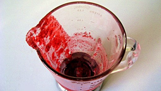 Pour the cranberry mixture from a blender into an ice cream maker / Photo by E. A. Wright 