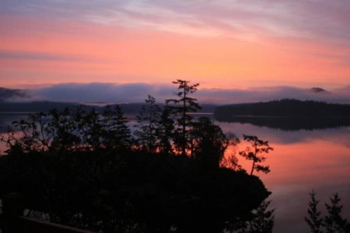 An early morning sunrise over the Sooke Basin, just outside of Victoria, BC on Vancouver Island.