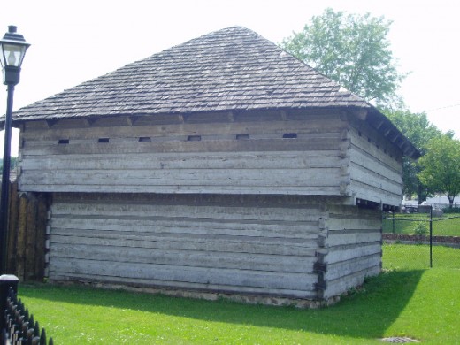 Outside view of Fort Buildings.  Note the overhang on the second story which allowed soldiers to shoot invaders surrounding the building through holes in the floor.  