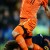 Netherlands' striker Arjen Robben gets by Spain's defender Carles Puyol . Netherlands' striker Arjen Robben gets by Spain's defender Carles Puyol .