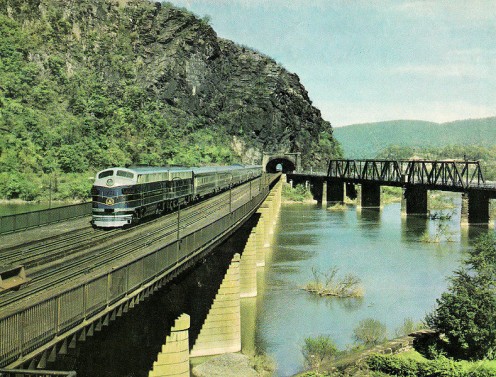 The old B & O or Baltimore and Ohio Railroad operated the new "Columbian" passenger train at Harpers Ferry, WV in this postcard photo from 1949. The old B & O or Baltimore and Ohio Railroad operated the new "Columbian" passenger train at Harpers Ferry, WV in this postcard photo from 1949.