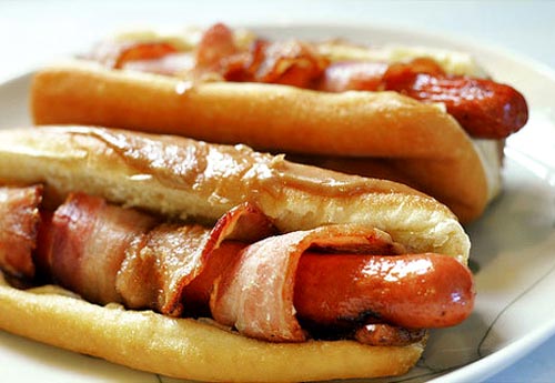 Here we have delicious bacon wrapped hot dogs that are always so very delicious. 