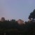 Downtown view over the trees with the setting sun. Downtown view over the trees with the setting sun.
