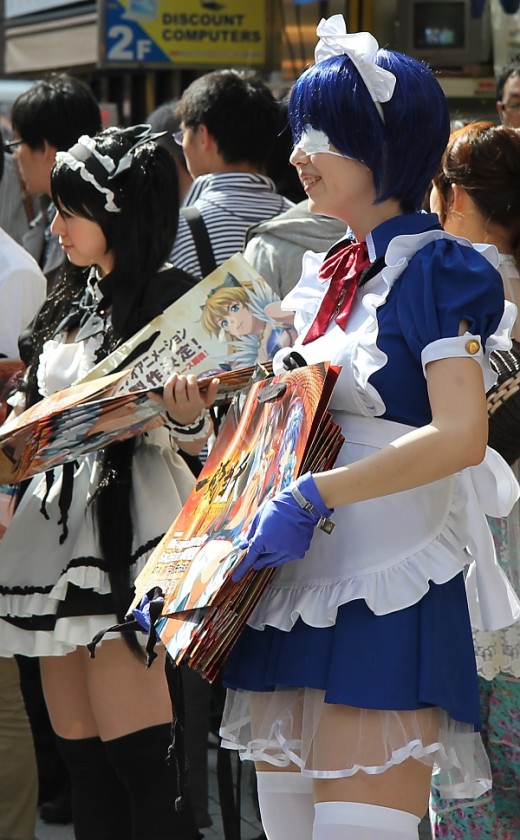 Cute Akihabara promotional girls handing out freebies to advertise the release of the Xtreme Xecutor anime on Blu-Ray and DVD