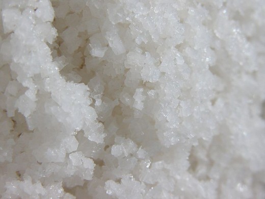 Natural ingredients, such as sea salt, are acceptable choices for macrobiotic cooking. Image of sea salt from Wikimedia Commons, courtesy of Christian Mertes through a creative commons license.