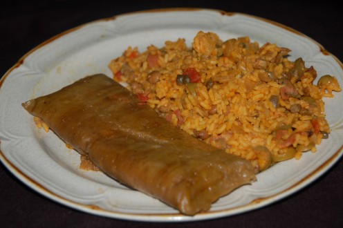  A green pastele served with Arroz con Gandules,It doesn't get more Puerto Rican than that!