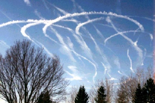 Why would several commercial jets turn about as these trails suggest? Perhaps they are left by military jets in a drill.