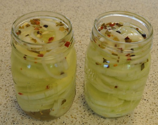 Filled jars.  Left jar contains brine in second use.