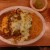 Chile Rellenos with green sauce, enchilada chicken and green sauce served with rice & beans Chile Rellenos with green sauce, enchilada chicken and green sauce served with rice & beans