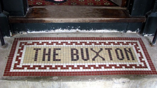 Tiled Welcome mat at the front door. 