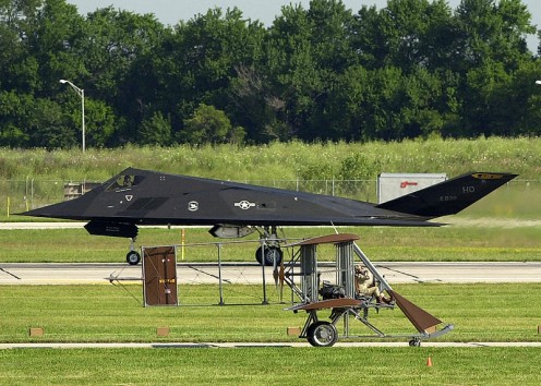 Replica of the Wright B Flyer and a USAF F-117A Stealth Fighter at the Dayton Air Show in 2003.