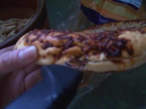 Cutting the panini lengthwise to create a pocket...