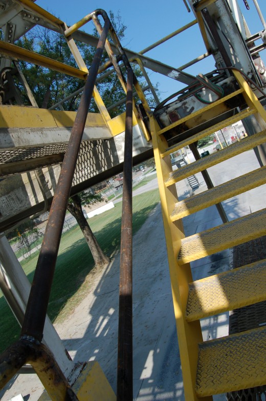 Finally got those handrails up.  Spent nearly all my work day tinkering with these rails, cutting, welding, grinding, and torching.  I'm glad it's Friday!! (I also mowed the yard, which you can somewhat see in the background.)