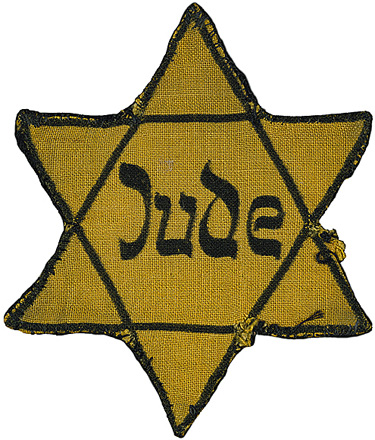 The "Yellow Star" which the Nazis forced Jews to wear. Image: Imperial War Museum