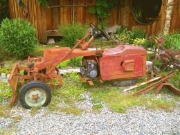 A tricycle piece of farm equipment may have had multiple uses.