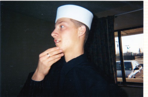 This is him as an adult, graduating from naval boot camp.