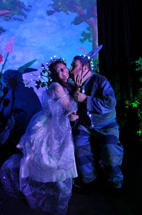 Rebecca Stier Reber, and John Edward Clark together in a scene from A Midsummer Night's Dream.