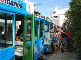 The Albufeira tourist train stops close to the Riviera Cake Shop