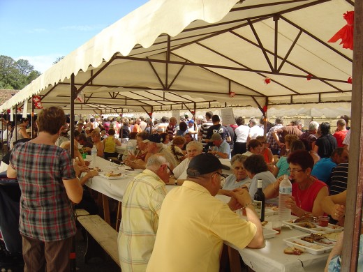 Lunch is eaten outdoors in the centre of the village
